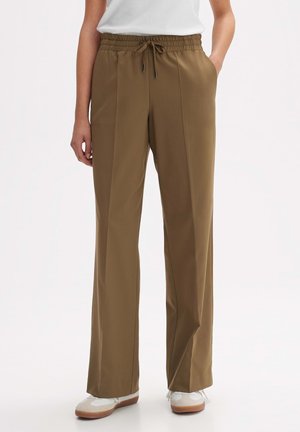 Brown wide-leg pants with a drawstring waist, featuring two side pockets and a smooth, lightweight fabric. Clean, minimalist design.