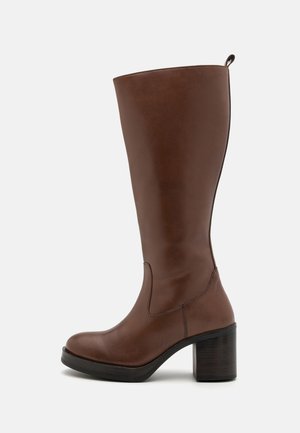 Brown leather knee-high boots with a block heel, smooth texture, rounded toe, and visible stitching on the side.