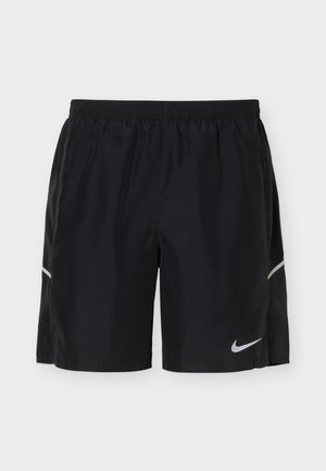 Black athletic shorts with elastic waistband, side pockets, subtle reflective strips, and a white Nike swoosh logo on the left leg.