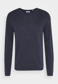 T-shirt manches longues col rond bleu marine en coton doux, présentant un design simple et épuré ainsi qu'une coupe décontractée.