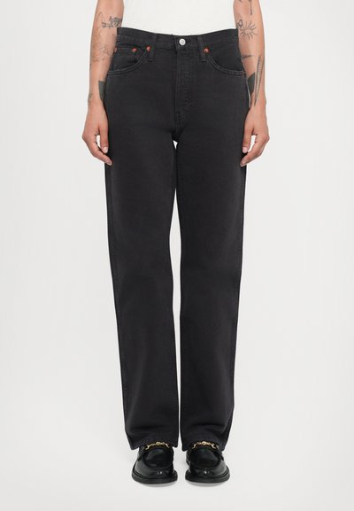 Zwarte denim jeans met een rechte pasvorm, met oranje hardware, vijf zakken en een klassieke knoopsluiting in de taille.