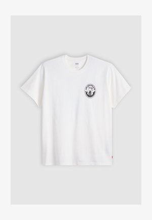 White cotton t-shirt with short sleeves, round neck, and a black circular logo on the left chest featuring a stylized design.