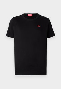 Sort bomulds t-shirt med rund hals og korte ærmer. Har et lille rødt Diesel-logo på brystet. Enkel, klassisk design.
