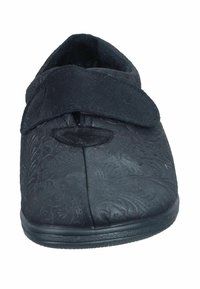 Black slippers with a textured floral pattern, a wide soft strap across the top, and a rubber sole for grip and comfort.