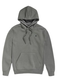 Sudadera con capucha gris hecha de una tela suave, con un bolsillo frontal, cordones y un pequeño logo en el pecho. Textura suave.