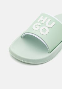HUGO NIL SLID - Mules - light/pastel green