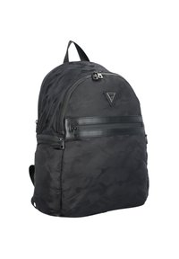 Sac à dos camouflage noir en nylon à texture lisse, doté d'une poche zippée à l'avant, d'un détail logo et de bretelles rembourrées.