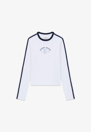 Wit overhemd met lange mouwen en marineblauwe strepen op de mouwen. Heeft de tekst "GUESS JEANS 81 California" in blauw en grijs. Kort model.