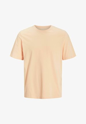 Pfirsichfarbener Baumwoll-T-Shirt mit kurzen Ärmeln, rundem Halsauschnitt und lockerer Passform. Glatte Textur und minimales Design.