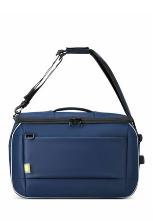 Borsa a spalla blu navy con lati imbottiti, zip nera, tracolla regolabile, tasca frontale e dettaglio del logo giallo sul lato.