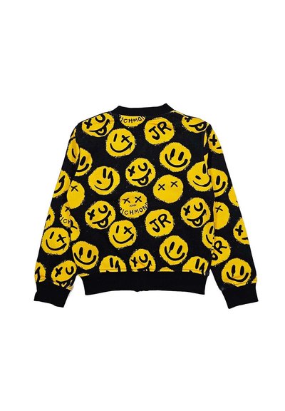 Maglione nero con motivi di faccine felici gialle e testo "JR". Presenta polsini e orlo a costine. Il materiale sembra avere una texture lavorata a maglia.