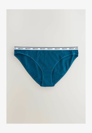 Teal naiste aluspüksid musta ja valge elastse vöökohtaga, millel on "NEXT" brändimine. Sile tekstuur, standardne lõige täieliku tagumise kattega.