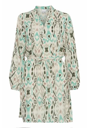 Mönstrad klänning i lätt tyg med ett turkos, grönt och rosa abstrakt tryck. Har en krage och ett knytbart midjeband. Långa ärmar.
