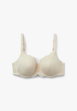 Soutien-gorge en dentelle beige clair avec armatures, bonnets rembourrés et bretelles réglables. Présente un motif floral et des bords festonnés sur les bonnets.