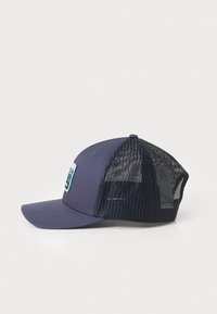 Navy blue cap with a solid front panel and mesh back, featuring a turquoise logo patch. Curved brim and adjustable snapback closure.