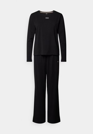 Zwart loungewear-set bestaande uit een top met lange mouwen en ronde hals en losse, wijde broek. Zachte stof; de top heeft een klein "BOSS"-logo op de borst.