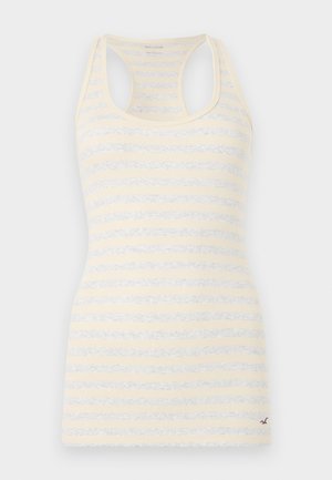 Αμάνικη ριμπ μπλούζα με racerback, οριζόντιες ρίγες σε κρεμ και ανοιχτό γκρι, στενή εφαρμογή και μικρό κεντημένο λογότυπο κάτω δεξιά.