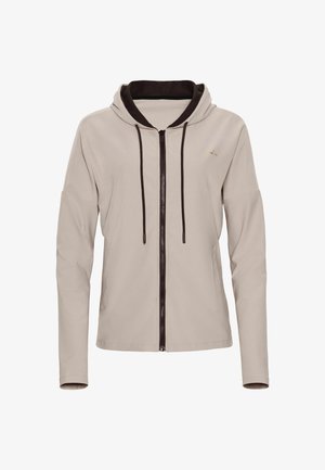 Hanorac bej cu fermoar, cu căptușeală neagră, șnururi negre, mâneci lungi, buzunare laterale și un mic logo auriu pe piept.