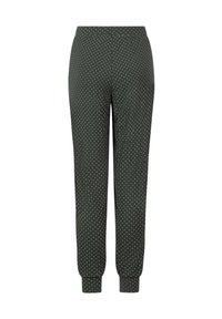 Donkergroene joggerbroek met witte stippen, voorzien van een elastische tailleband en boorden. Gemaakt van een zachte, gestructureerde stof.