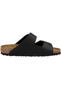 Sandales noires à滑上 avec deux lanières supérieures, semelle en liège et semelle extérieure en caoutchouc texturé. Présente un design solide et une construction ouverte au niveau des orteils.
