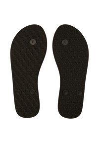 Soli delle scarpe in gomma nera con una superficie testurizzata, caratterizzati da un motivo geometrico e contrassegnati con 'L' e 'R' per sinistra e destra.