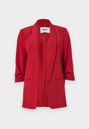 Blazer roșu din țesătură fină, cu guler șal, mâneci trei sferturi și accente cu buzunare frontale. Design minimalist.