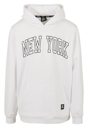 Valge kapuutsiga sviiter, millel on rinnal musta värvi tugevate tähtedega trükitud "NEW YORK". Sisaldab eesmist taskut ja soonikkraega varrukaid.