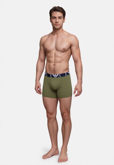 Olive green boxer shorts with a navy waistband featuring a logo, made from stretchable fabric, styled with a fitted design.
