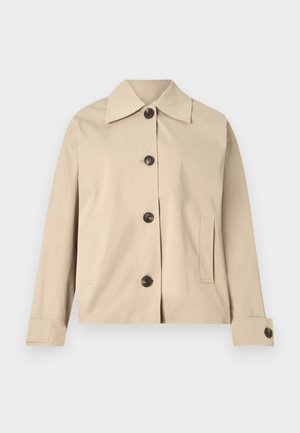 Veste beige en coton, dotée d'un col classique, de boutons à l'avant et de poches latérales ; texture lisse et design structuré.