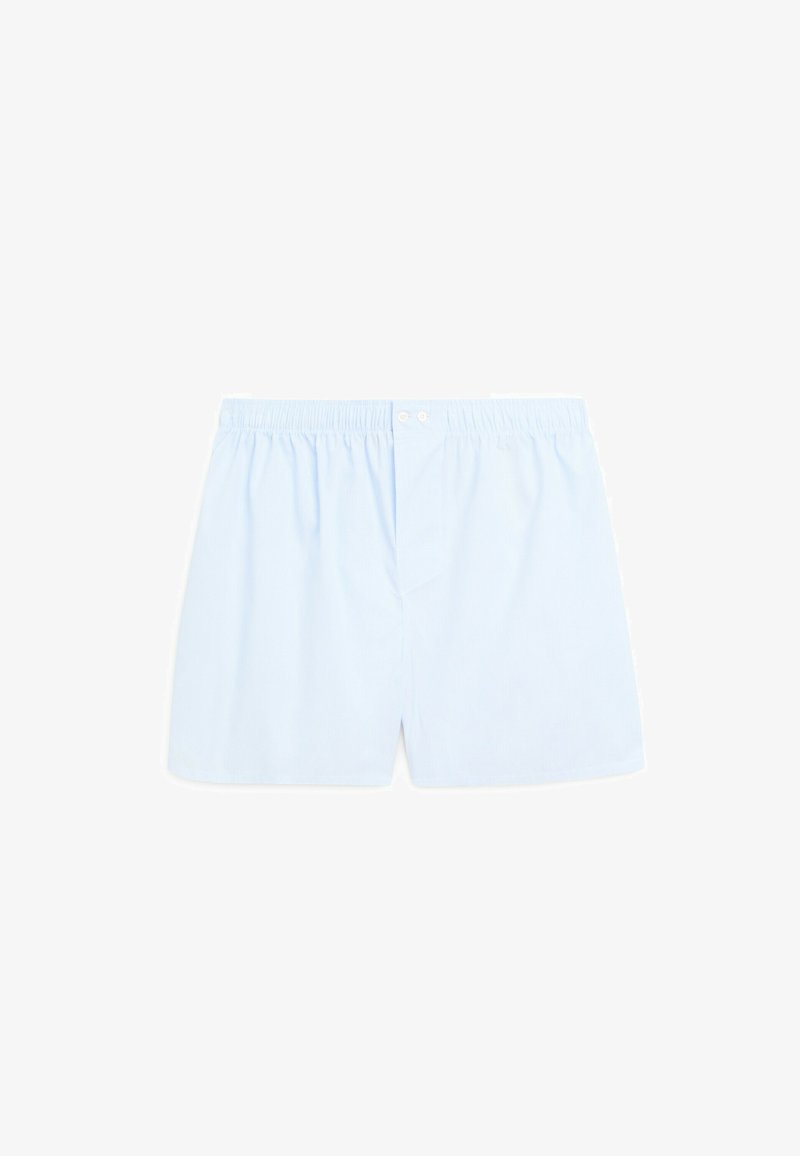 Light blue cotton boxers with a relaxed fit, featuring an elastic waistband and two front buttons, smooth texture, and minimal design.