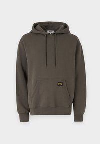Dark olive green hoodie made of cotton, featuring a front pocket, drawstring hood, ribbed cuffs, and a small yellow logo tag.