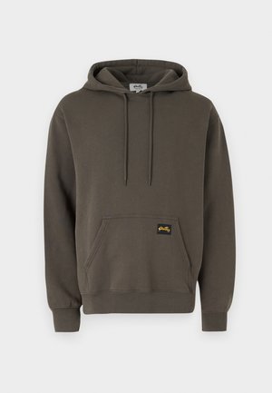 Dark olive green hoodie made of cotton, featuring a front pocket, drawstring hood, ribbed cuffs, and a small yellow logo tag.