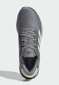 adidas Performance SUPERNOVA  - Trail running shoes - grey three   semi green spark   dash grey