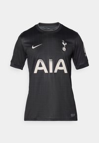 Maglia da calcio nera con motivo a griglia, dotata di colletto rotondo, maniche corte e il logo AIA in evidenza in bianco. Inclusa la swoosh Nike.