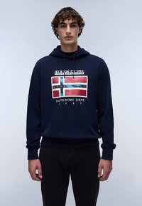 Marineblauwe hoodie met een grafische print van een vlagontwerp. Heeft ribgebreide manchetten en een tailleband. Het materiaal is waarschijnlijk een katoenmengsel.