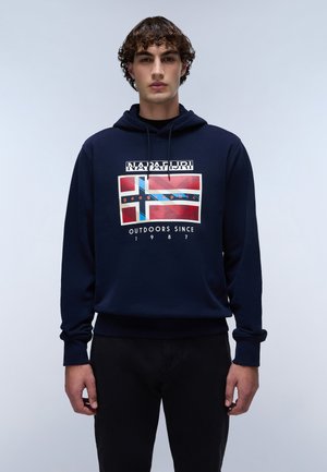 Navy blue hooded sweatshirt with a graphic print of a flag design. Features ribbed cuffs and waistband. Material is likely cotton blend.