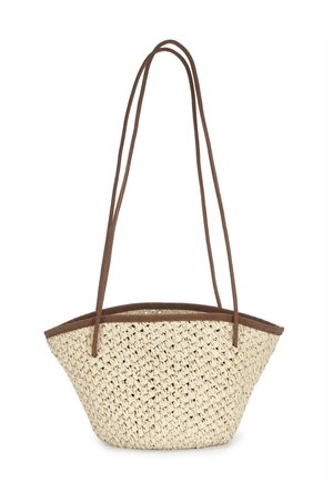 Woven beige straw handbag with a wide, rounded shape and thin, long brown leather shoulder straps and trim.