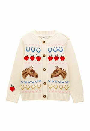 Cárdigan de punto crema con botones marrones, con cabezas de caballo, manzanas rojas y patrones de herraduras azules y doradas.