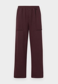 Bordeaux sweatpants lavet af blødt bomuldsblanding, med en afslappet pasform, elastisk talje og to forlommer med rektangulære klapper.
