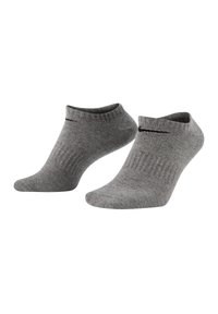 Calze alla caviglia grigie realizzate in misto cotone, con texture a coste e un accento con logo nero nella parte superiore. Design leggero e aderente.