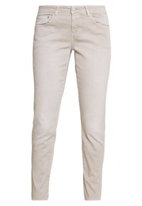 Beige bomull skinny jeans med femficksdesign, knappstängning och stickade sömmar. Slät textur och slim fit genom hela benen.