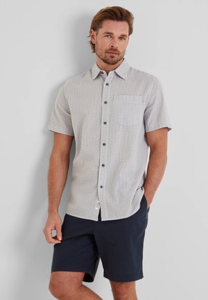 Short-sleeve button-up shirt in checkered pattern, light beige and brown, cotton material, with a chest pocket and contrasting buttons.