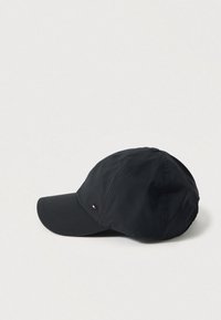 Black baseball cap made of lightweight fabric, featuring a curved brim and a small logo accent on the side.