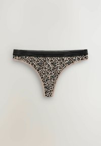 Thong imprimé léopard avec un fond beige, bord en dentelle noire à la taille et texture de tissu douce. Présente une forme triangulaire et une couverture minimale.