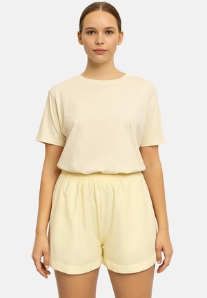 Light yellow cotton t-shirt with short sleeves paired with matching lightweight shorts. Elastic waistband and soft texture throughout.