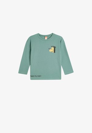 Langærmet grøn bomulds skjorte med en gul næsehornsgrafik og teksten "hør mit brøl!" trykt i sort. Tekstureret stof.