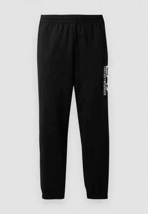Black athletic pants made of smooth fabric, featuring an elastic waistband and cuffs, and a contrasting logo printed on the side.