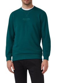 Felpa teal con colletto a girocollo, polsini e orlo in maglia ribbed, con dettagli cuciti e un logo stampato sul davanti in un colore a contrasto.