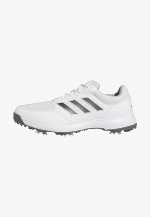 Adidași albi cu un upper texturat, trei dungi argintii și o talpă din cauciuc gri cu țepi modelați pentru aderență.