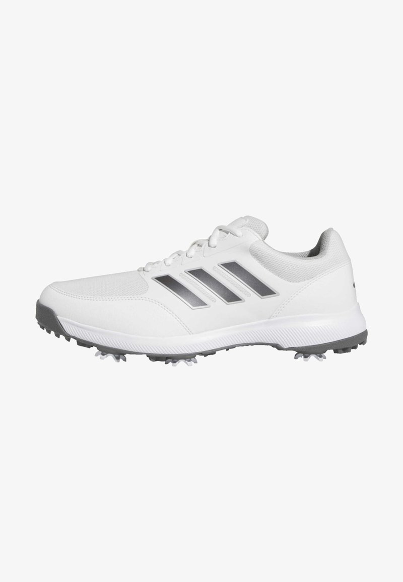 White athletic shoe with a textured upper, three silver stripes, and a grey rubber sole with molded spikes for traction.